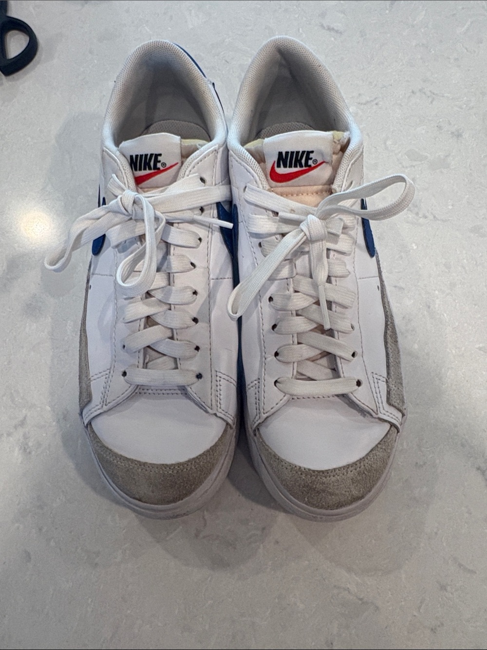 Nike Men’s White Sneakers with Blue Swoosh